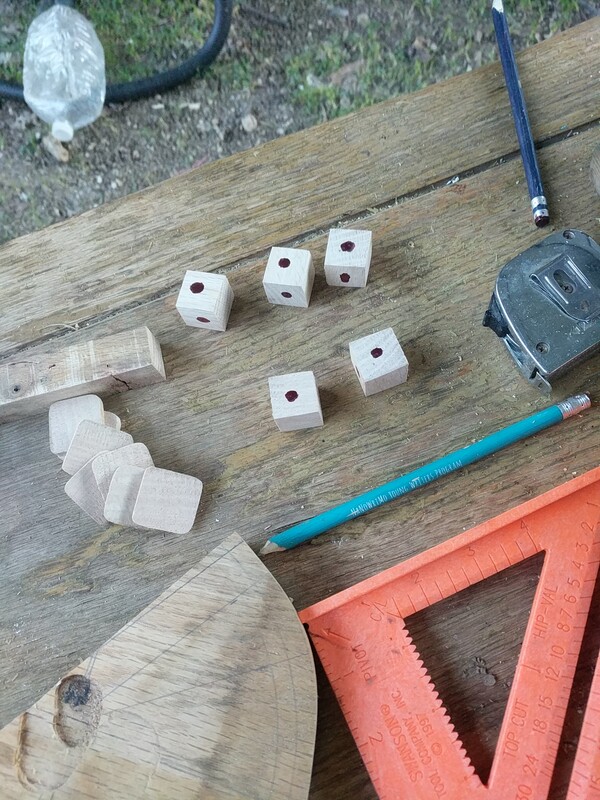 5 cubes of pale oak with pips of cabernet stain