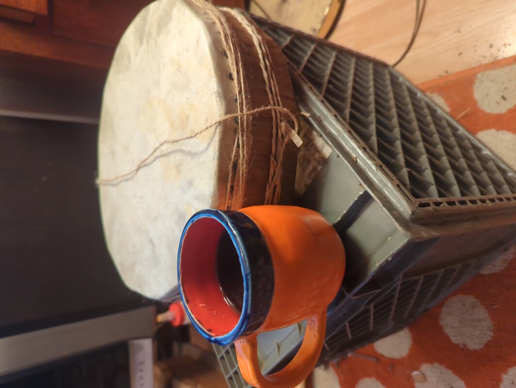 the finished drum, with a cup of coffee