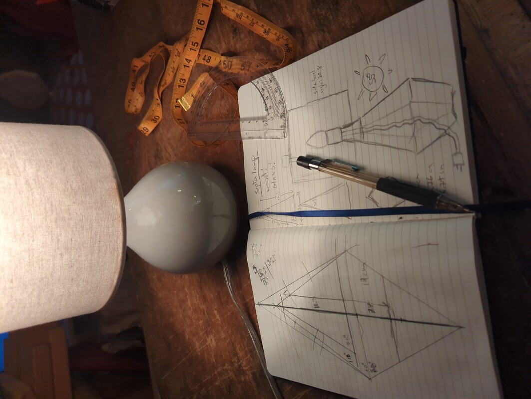 lines and angles drawn in a notebook.